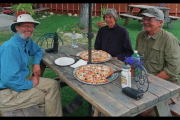 We prepare to dig into our pizza dinner.