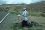 Rico Mundy stops to fix a flat on the way up to Bitterwater.