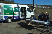 Pat Parseghian staffs the check-in table.
