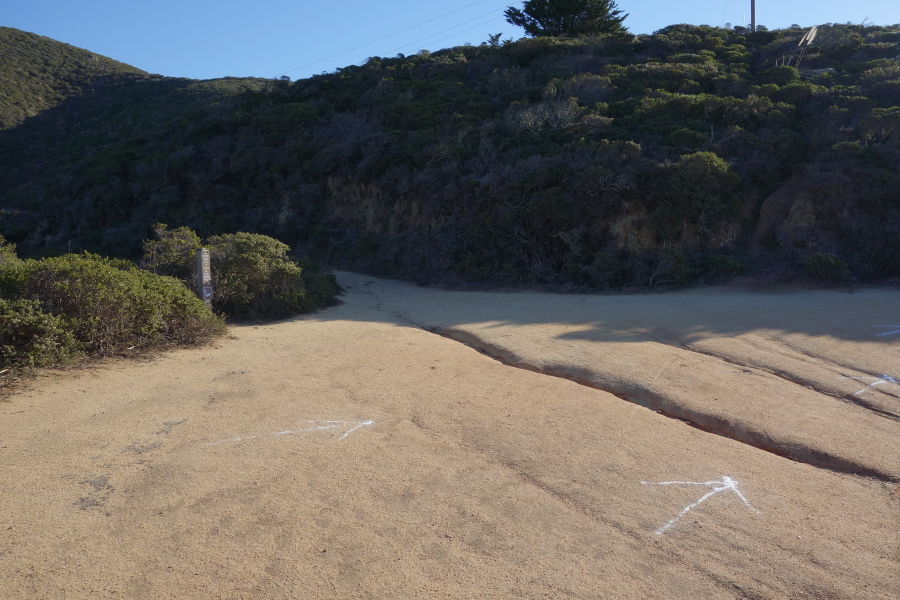 Follow the arrows up the mountain.