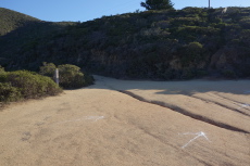 Follow the arrows up the mountain.