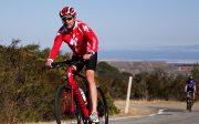 Rich Karlgaard passes Ridge Winery on his Specialized Turbo.