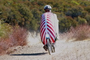Bill climbs the dirt road above Montevina.