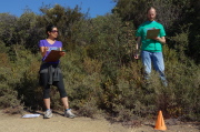 The finish line team stands ready. (Stefanie Nishimura (l) and Gregory P. Smith)