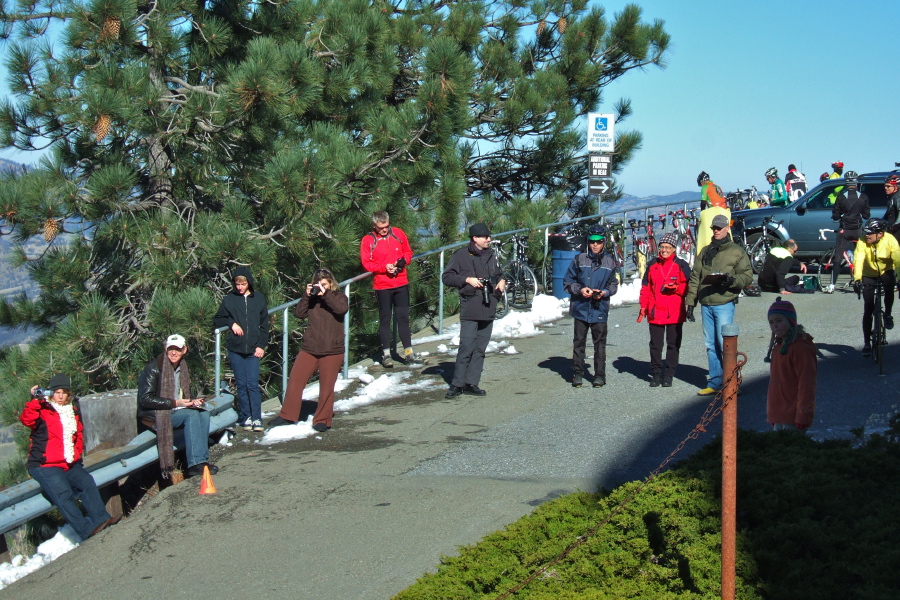 The finish line crew enjoy the sunshine.