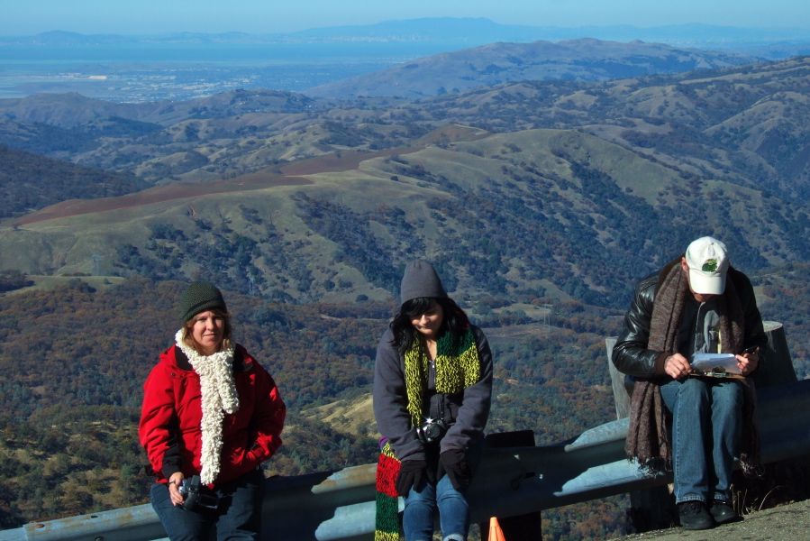 Brenda Brunner, ?, and Howard Kveck at the finish line