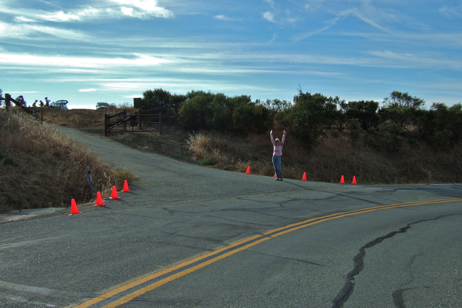 Christine Holmes directs everyone to the registration area.