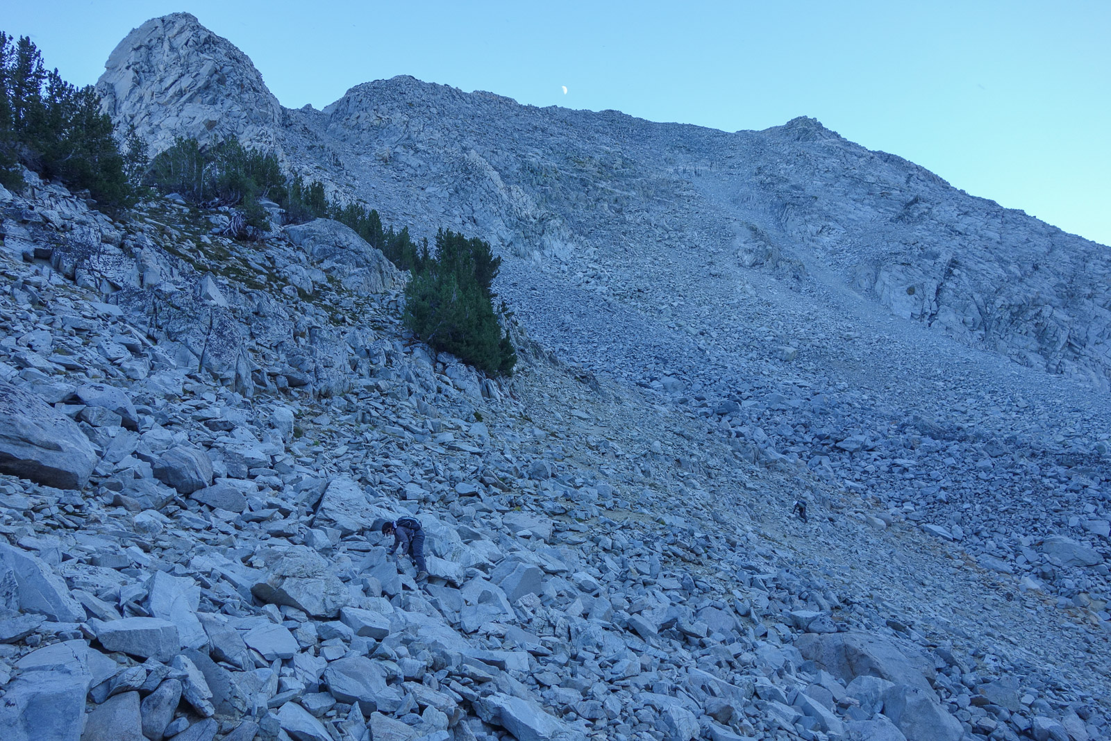 Half-moon rises over Lookout Peak.