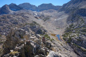 In the background are Treasure Peak, Mt. Dade, Mt. Abbott, Petit Griffon, Mt. Mills and Mills Lakes.