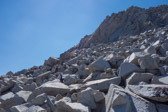 Frank and Stella make their way down the talus.