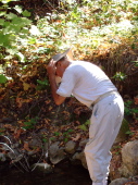 Going for another hat-full of water.