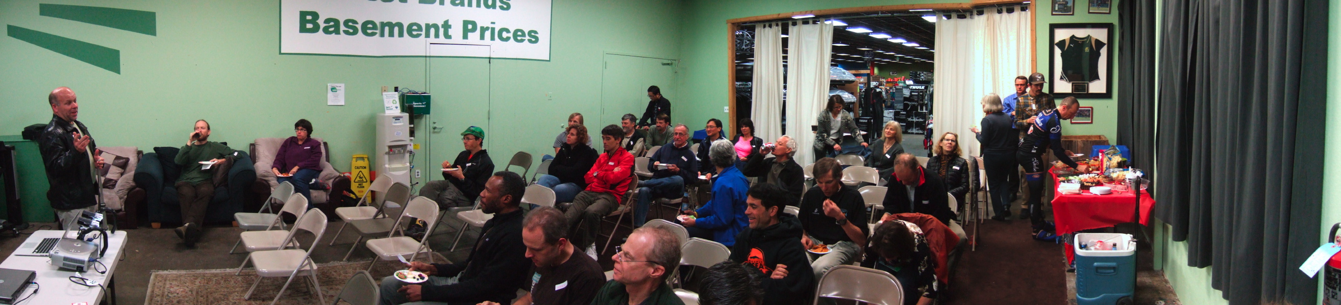 The audience gives Ron Brunner their full attention.