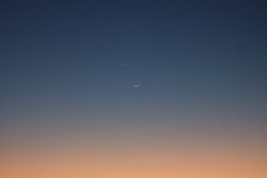The waxing crescent begins to appear.