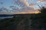 Laura starts the hike back into the rapidly-setting sun.