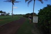 The cliff trail runs along the edge of a golf course.