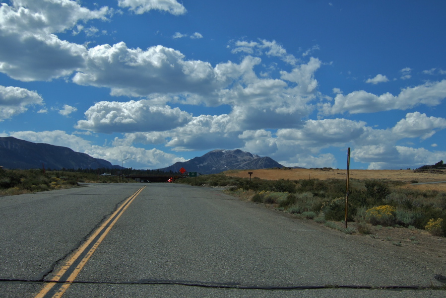 Interesting puffy clouds begin to develop over Mammoth Mountain.