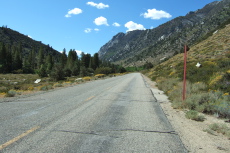 Climbing a long, straight section of Upper Rock Creek Rd.