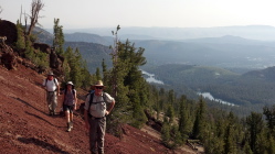 Marc, Trudy, and Brian on the red rock near the top of the climb