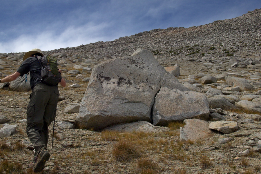 Bill pushes up the sandy slope for the low point on the ridge.