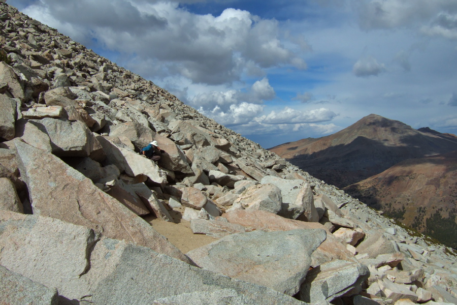 Frank enjoys descending on the rocks more than mucking in the sand.