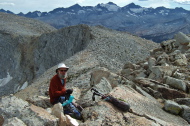 Frank eats some lunch after his scramble up the ridgeline.