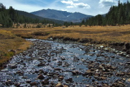 Parker Pass Creek flows from Spillway Lake below Kuna Peak (13002ft) in the distance