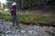 Bill inspects the iron oxide seep from Vomit Creek one last time.