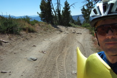 Looking back at more rocks in the road surface