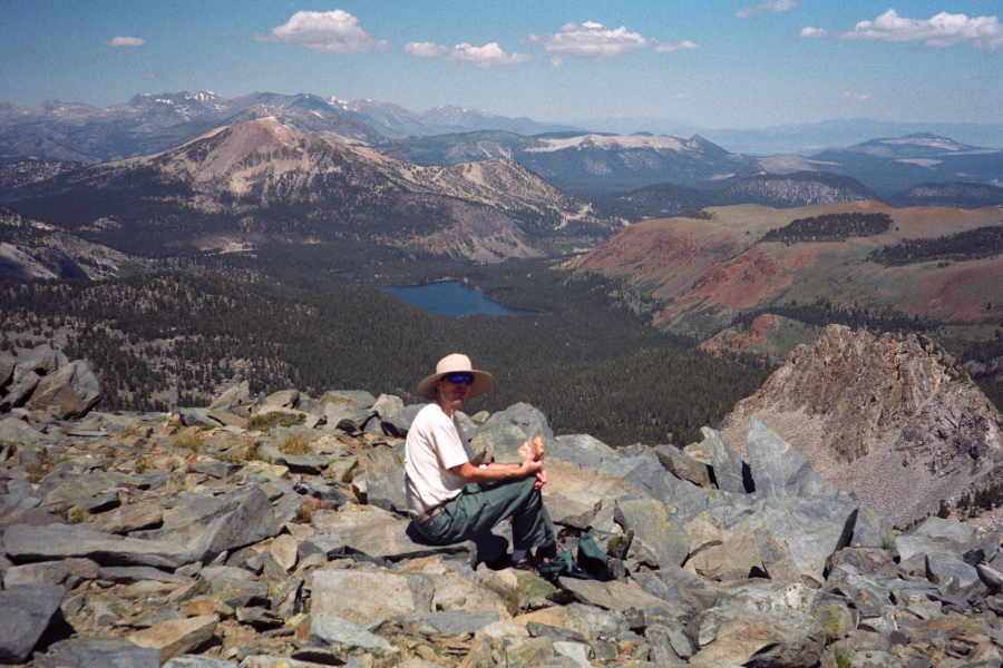 Bill eats lunch at the edge of the great plateau.