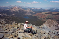 Bill eats lunch at the edge of the great plateau.