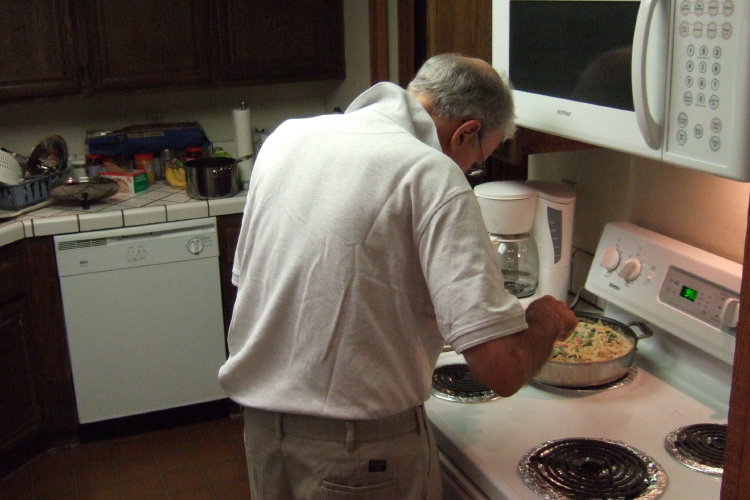 David preparing linguini alfredo.