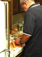 Ron prepares the salad.