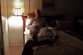 David rests after a 20-hour day.