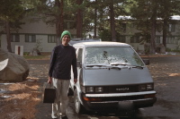 Bill loads up the snow-covered van before we check out.