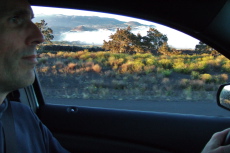 Bill drives down Saddle Road.
