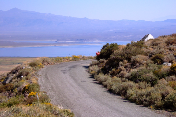 Ron disappears around a corner on McGee Creek Rd.
