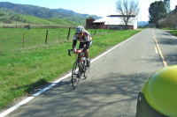 Passing a solo rider near Bitterwater School.