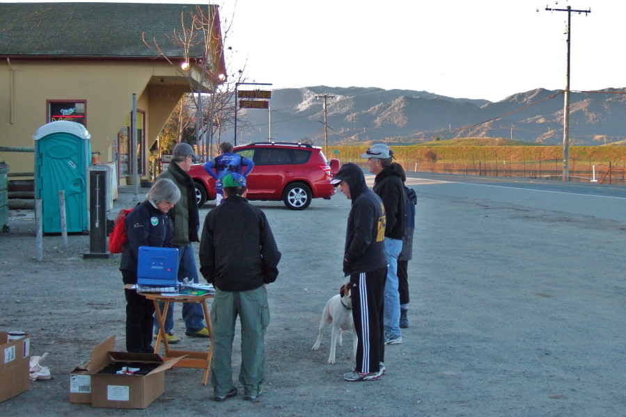 Volunteers wait for the first registrants.
