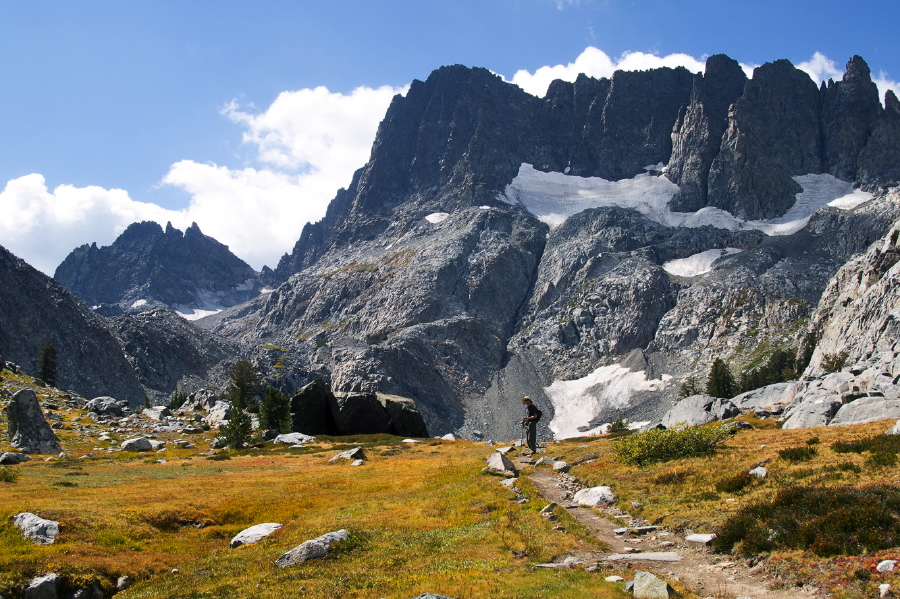 Bill waits ahead on the trail to Iceberg Lake.