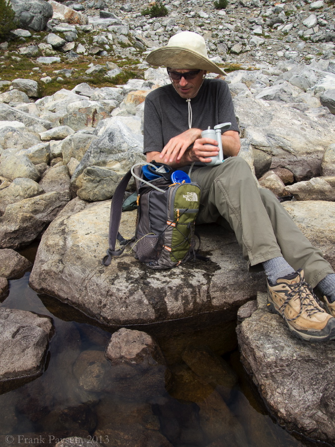Bill crossly pumps water from a tarn.