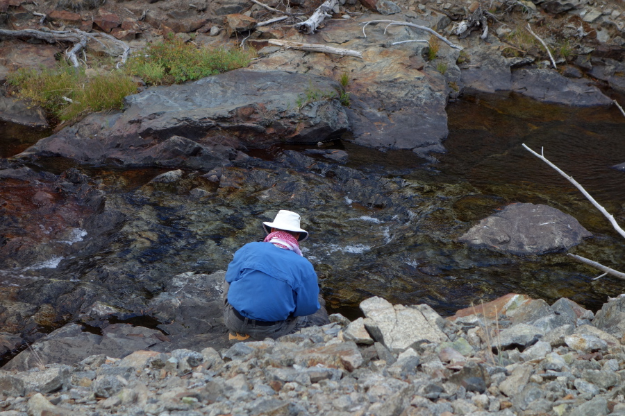 Frank filters water from Minaret Creek.