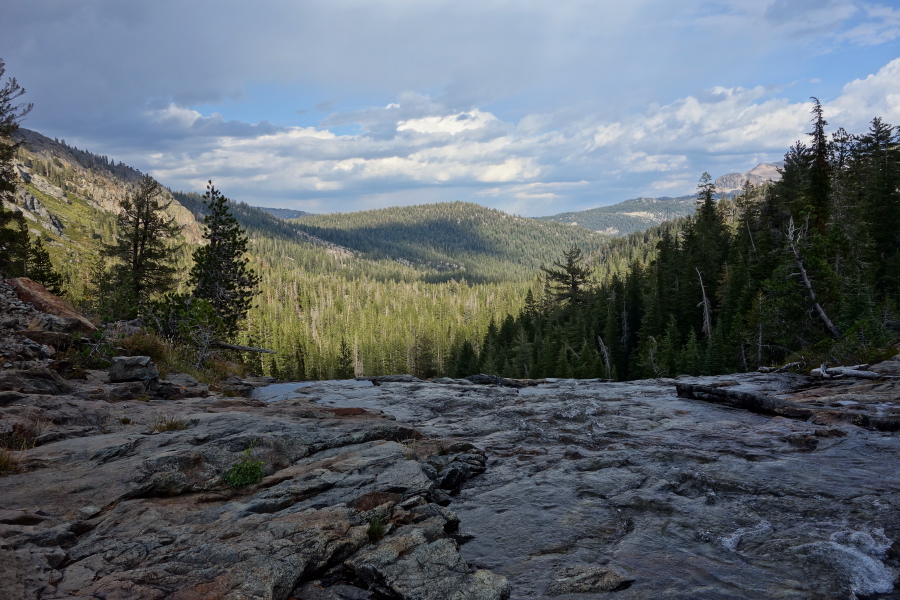 Minaret Creek flows over the brink of a rock slide.