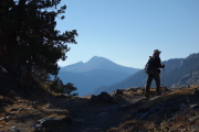 Frank climbs past a view of Mammoth Mountain.