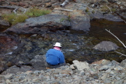 Frank filters water from Minaret Creek.
