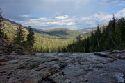 Minaret Creek flows over the brink of a rock slide.
