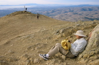 David hiding from the wind on the summit of Mission Peak (2517ft)