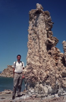 Bill next to a large tufa tower.