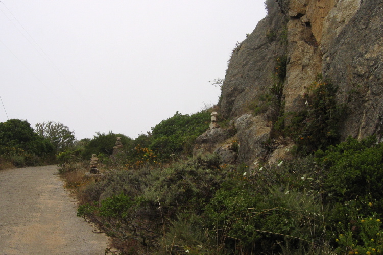 Cairns mark a popular rock climbing area. (780ft)