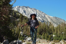 Stella is ready for adventure with her seldom-used foldable hiking sticks.