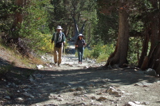 Frank and Stella descend from Chickenfoot Lake.
